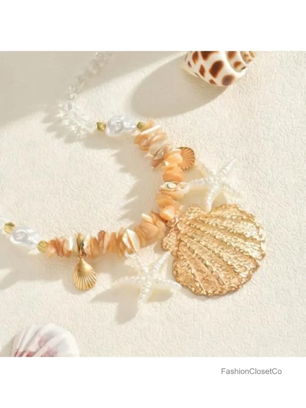 N/A gold seashell